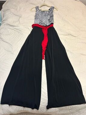 Connected Apparel Black Wide-Leg Jumpsuit with Patterned Bodice and Red Sash